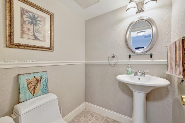 2097 S Ocean Unit 207, Hallandale Beach, FL 33009 - bathroom featuring toilet and a sink