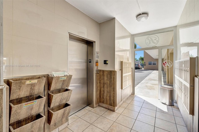 2097 S Ocean Unit 207, Hallandale Beach, FL 33009 - bathroom featuring elevator and tile patterned floors