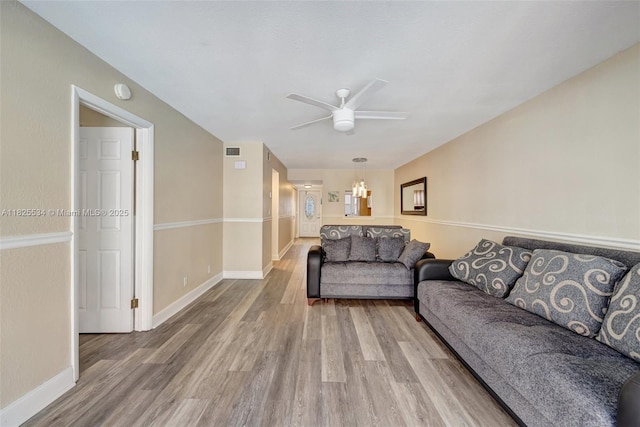 2097 S Ocean Unit 207, Hallandale Beach, FL 33009 - living area with wood finished floors and ceiling fan