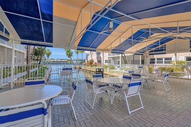 2097 S Ocean Unit 207, Hallandale Beach, FL 33009 - view of patio featuring outdoor dining area and a water view