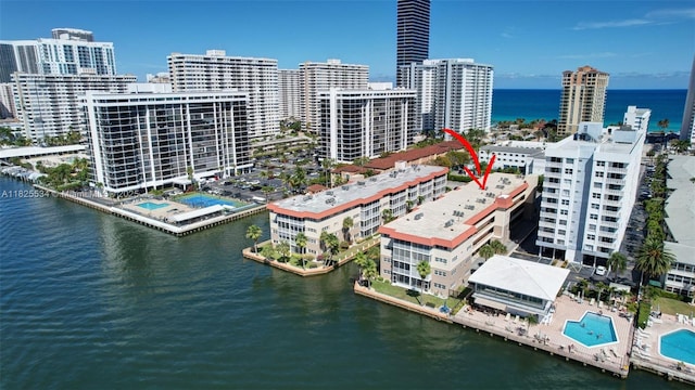 2097 S Ocean Unit 207, Hallandale Beach, FL 33009 - view of urban area with a nearby body of water and a pool area