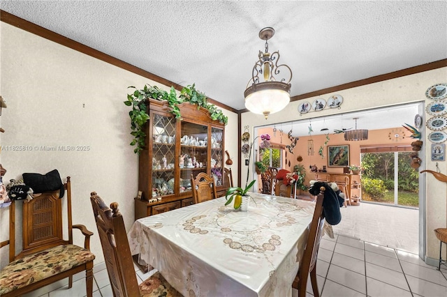 3820 SW 122nd Ave, Miami, FL 33175 - dining space with a textured ceiling, ornamental molding, and light tile patterned floors