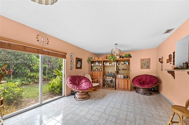 3820 SW 122nd Ave, Miami, FL 33175 - living area featuring a chandelier