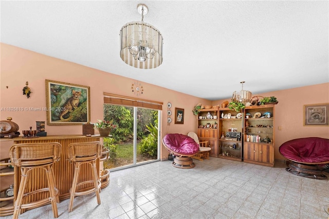 3820 SW 122nd Ave, Miami, FL 33175 - dining space with a chandelier and a dry bar