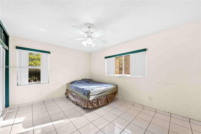 3820 SW 122nd Ave, Miami, FL 33175 - bedroom with a textured ceiling and ceiling fan