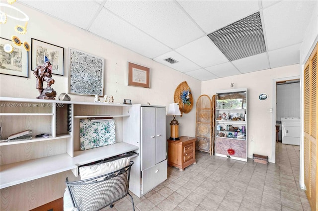 3820 SW 122nd Ave, Miami, FL 33175 - home office featuring a drop ceiling, washer / dryer, and light tile patterned flooring