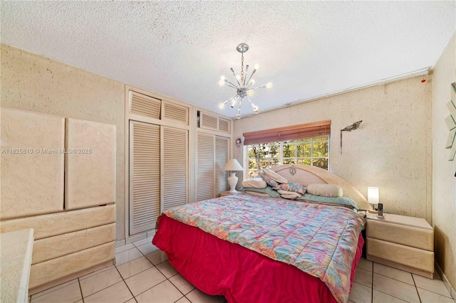 3820 SW 122nd Ave, Miami, FL 33175 - tiled bedroom with a chandelier and a textured ceiling