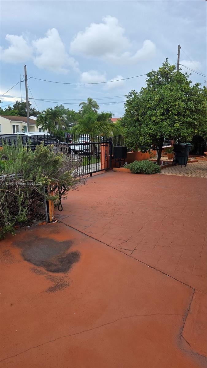 2327 SW 1st St, Miami, FL 33135 - view of patio featuring a gate