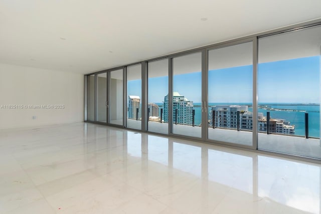 300 Biscayne Blvd Way Unit 3902, Miami, FL 33131 - unfurnished room featuring a wall of windows and a water view