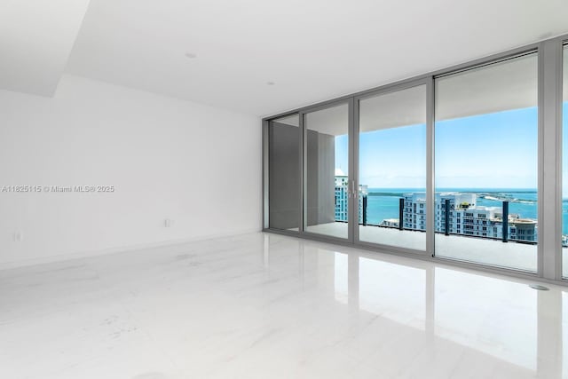 300 Biscayne Blvd Way Unit 3902, Miami, FL 33131 - spare room with a wall of windows and a water view