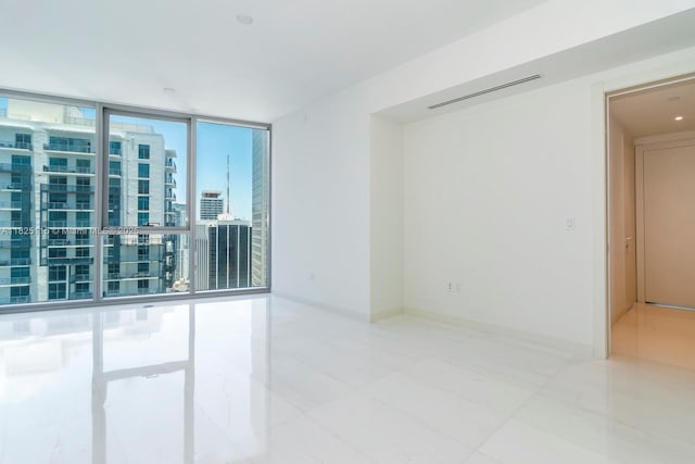 300 Biscayne Blvd Way Unit 3902, Miami, FL 33131 - tiled empty room with floor to ceiling windows