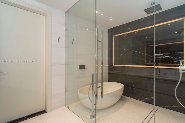 300 Biscayne Blvd Way Unit 3902, Miami, FL 33131 - full bathroom with a shower stall, a soaking tub, tile walls, and recessed lighting