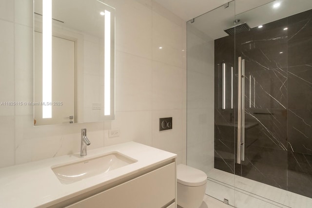 300 Biscayne Blvd Way Unit 3902, Miami, FL 33131 - bathroom with a marble finish shower, vanity, and tile walls