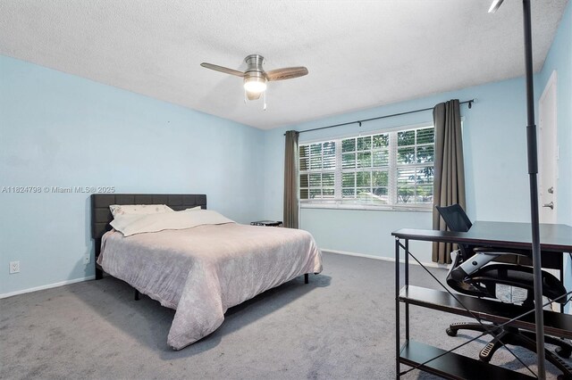 3660 Citrus Trce Unit 4, Davie, FL 33328 - bedroom with an office area, carpet floors, a textured ceiling, and a ceiling fan