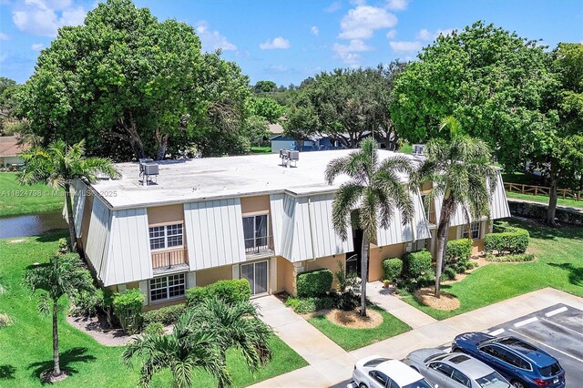 3660 Citrus Trce Unit 4, Davie, FL 33328 - view of property with uncovered parking