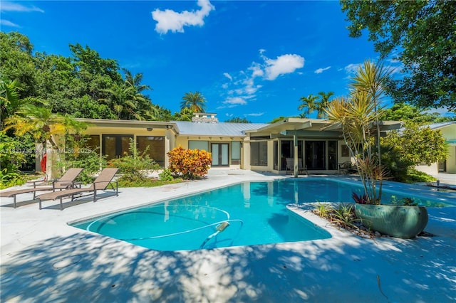 2691 SW 110th Way, Davie, FL 33328 - outdoor pool featuring french doors and a patio area