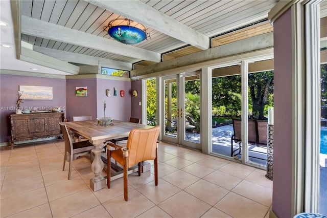 2691 SW 110th Way, Davie, FL 33328 - dining area featuring light tile patterned floors and beam ceiling