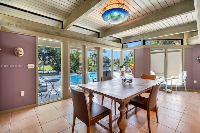 2691 SW 110th Way, Davie, FL 33328 - dining area featuring french doors, light tile patterned floors, and a wooden ceiling with exposed beams