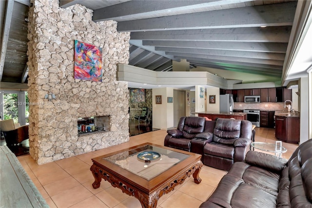 2691 SW 110th Way, Davie, FL 33328 - living room with light tile patterned floors and a stone fireplace