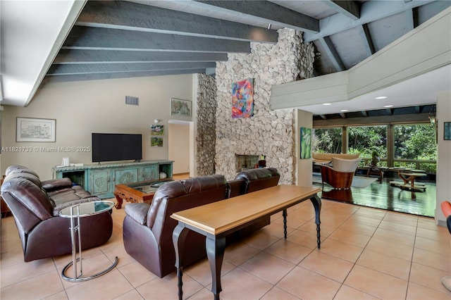 2691 SW 110th Way, Davie, FL 33328 - living room with a stone fireplace, beam ceiling, light tile patterned floors, and high vaulted ceiling