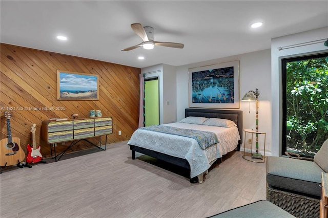 2691 SW 110th Way, Davie, FL 33328 - bedroom with recessed lighting, wood finished floors, a ceiling fan, and wood walls