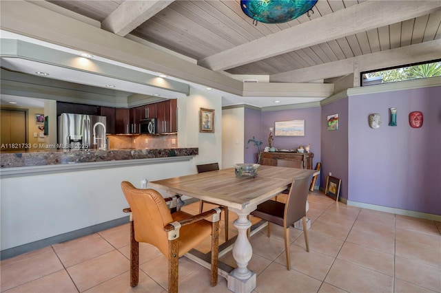 2691 SW 110th Way, Davie, FL 33328 - dining area with light tile patterned floors and a wooden ceiling with exposed beams