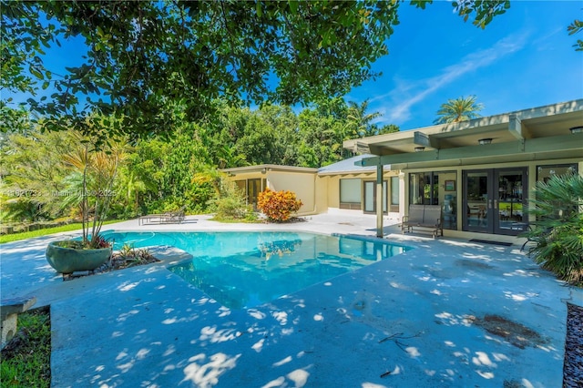 2691 SW 110th Way, Davie, FL 33328 - outdoor pool featuring french doors and a patio