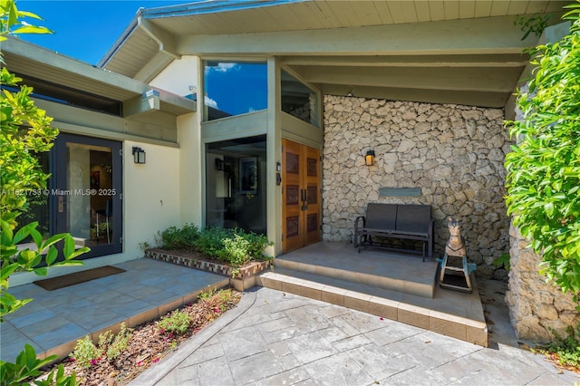 2691 SW 110th Way, Davie, FL 33328 - entrance to property featuring stone siding, french doors, and stucco siding
