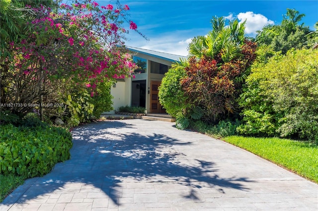 2691 SW 110th Way, Davie, FL 33328 - obstructed view of property with driveway and stucco siding