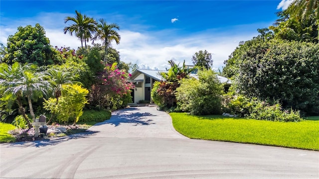 2691 SW 110th Way, Davie, FL 33328 - obstructed view of property featuring driveway and a front yard