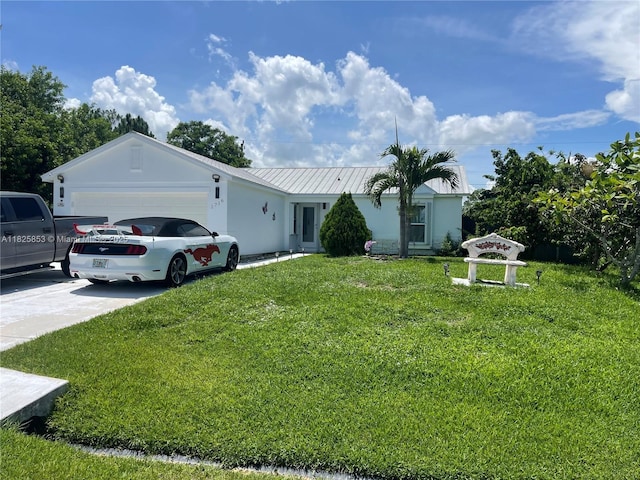 1716 SW Cordova St, Port St Lucie, FL 34987 - ranch-style house featuring a garage, a front yard, driveway, stucco siding, and a metal roof