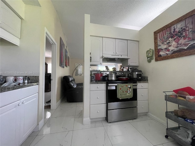 1716 SW Cordova St, Port St Lucie, FL 34987 - kitchen featuring electric stove, light marble finish floors, under cabinet range hood, white cabinets, and a textured ceiling