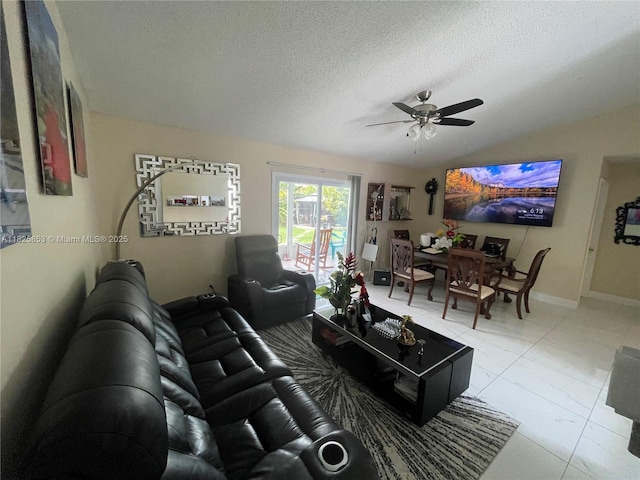 1716 SW Cordova St, Port St Lucie, FL 34987 - living room featuring a ceiling fan, lofted ceiling, and a textured ceiling