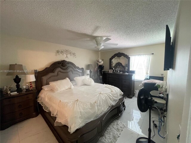1716 SW Cordova St, Port St Lucie, FL 34987 - bedroom featuring a textured ceiling and ceiling fan