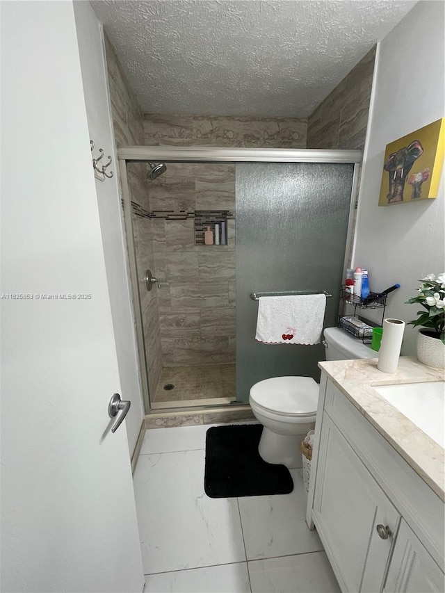 1716 SW Cordova St, Port St Lucie, FL 34987 - full bath featuring marble finish floors, vanity, a shower stall, and a textured ceiling