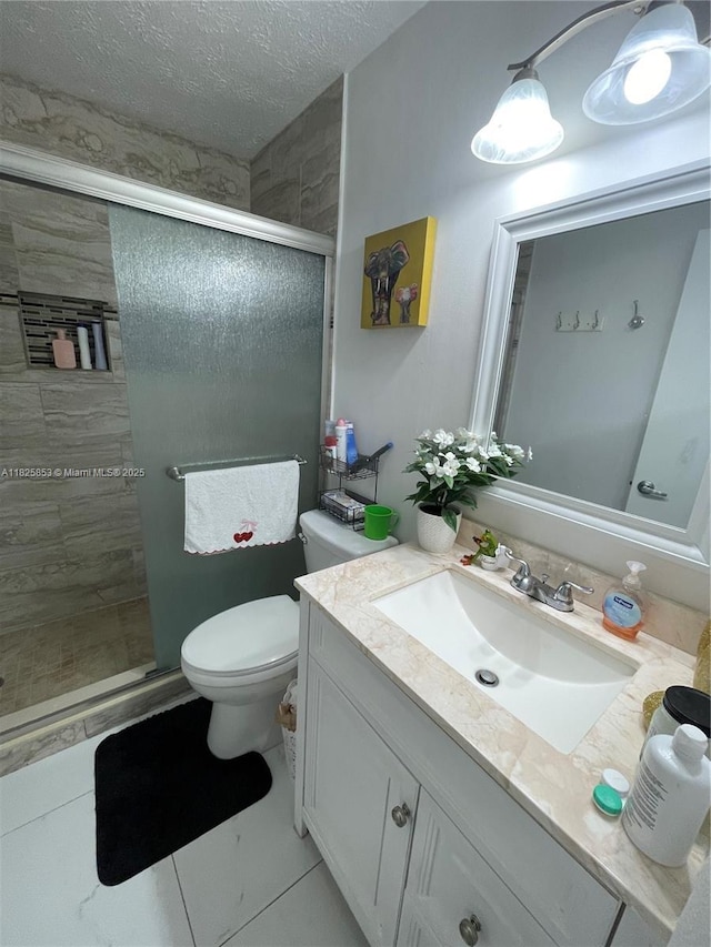 1716 SW Cordova St, Port St Lucie, FL 34987 - bathroom with vanity, a shower stall, and a textured ceiling