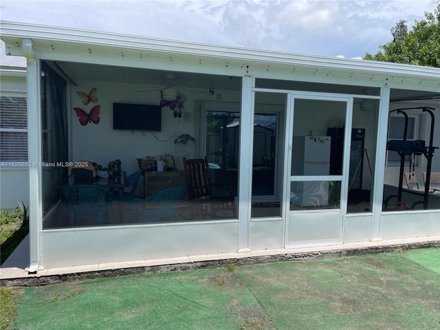 1716 SW Cordova St, Port St Lucie, FL 34987 - back of property featuring a sunroom