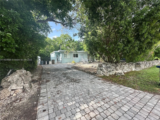 349 Mahogany Dr, Key Largo, FL 33037 - view of front facade featuring decorative driveway