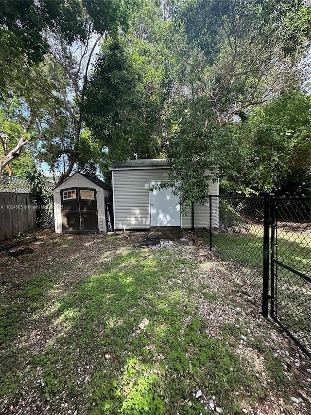 349 Mahogany Dr, Key Largo, FL 33037 - fenced backyard featuring a shed