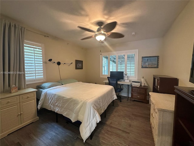 349 Mahogany Dr, Key Largo, FL 33037 - bedroom with dark wood-style flooring, a ceiling fan, and an office area