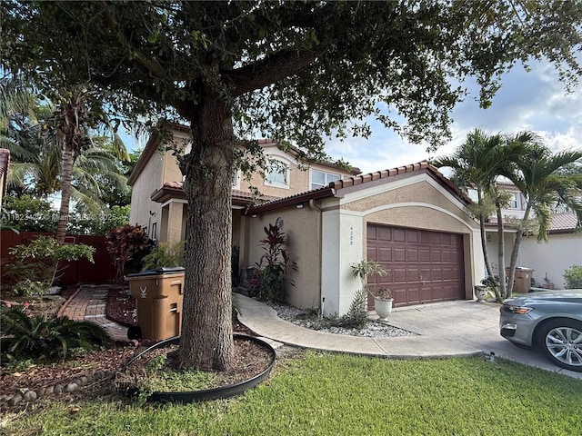 4280 NW 1st Pl, Deerfield Beach, FL 33442 - view of front facade featuring stucco siding, concrete driveway, a garage, and a tiled roof