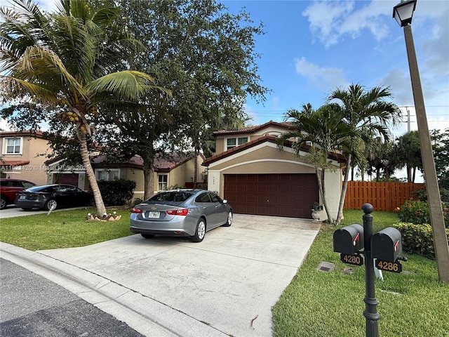 4280 NW 1st Pl, Deerfield Beach, FL 33442 - view of front facade featuring driveway, an attached garage, and stucco siding