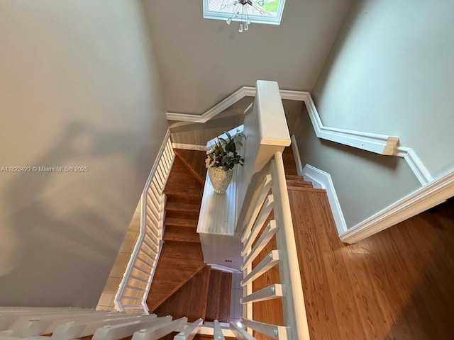 4280 NW 1st Pl, Deerfield Beach, FL 33442 - staircase featuring a chandelier