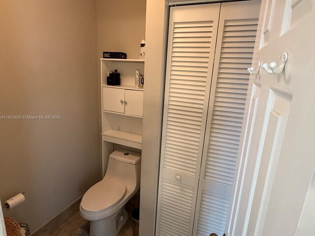 4280 NW 1st Pl, Deerfield Beach, FL 33442 - bathroom featuring a closet and toilet