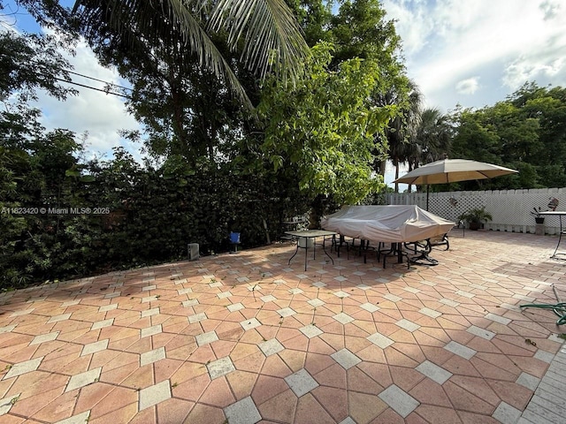 4280 NW 1st Pl, Deerfield Beach, FL 33442 - view of patio featuring outdoor dining space and grilling area