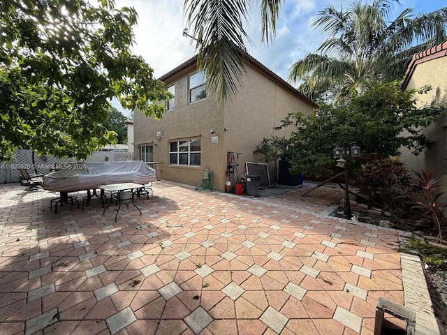 4280 NW 1st Pl, Deerfield Beach, FL 33442 - view of patio / terrace with outdoor dining area and a grill