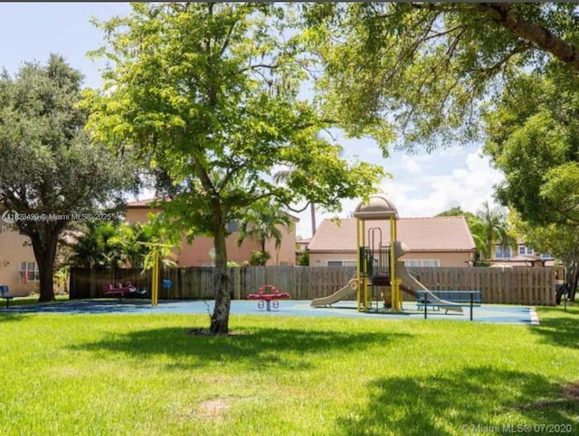 4280 NW 1st Pl, Deerfield Beach, FL 33442 - view of yard featuring a playground