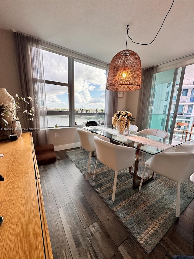 2681 N Flamingo Rd Unit 908S, Sunrise, FL 33323 - dining room featuring hardwood / wood-style flooring and a water view