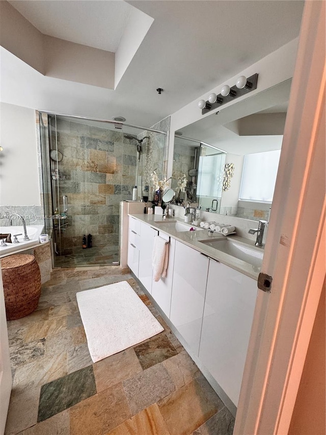 2681 N Flamingo Rd Unit 908S, Sunrise, FL 33323 - full bathroom featuring a shower stall, double vanity, a bath, and stone finish flooring
