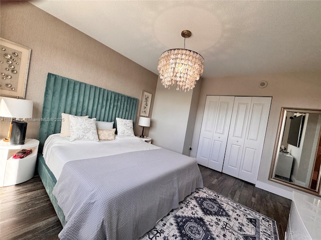 2681 N Flamingo Rd Unit 908S, Sunrise, FL 33323 - bedroom featuring a chandelier, wood finished floors, a closet, and a textured ceiling